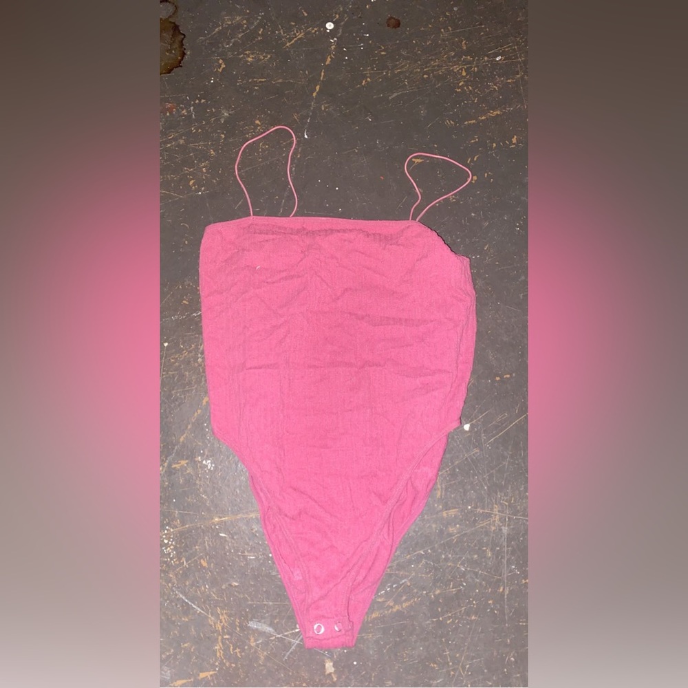 Pink bodysuit. Super cute and super comfortable.